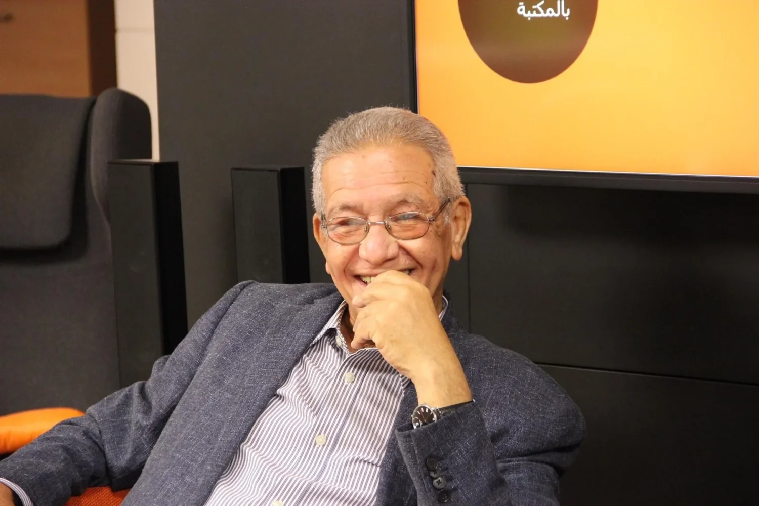 صورة شخصية لكمال رُحيّم مبتسمًا خلال مناسبة