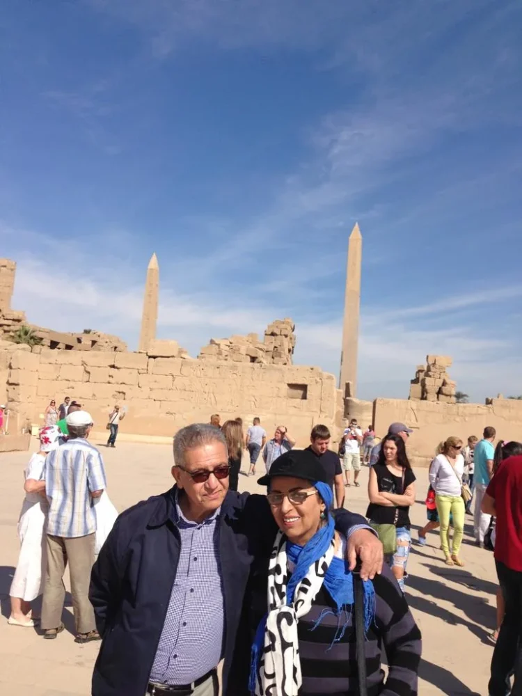 Kamal Ruhayyim with his wife, Dr. Suzan Salem, at an ancient Egyptian monument.